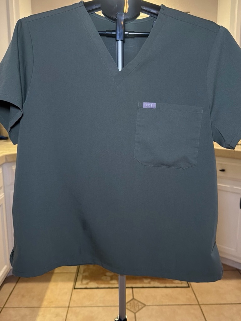 FIGS women’s oliveGreen V-Neck Scrub Top small discoloration lower left